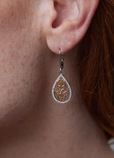 Close up of red haired model wearing Sterling Silver 
